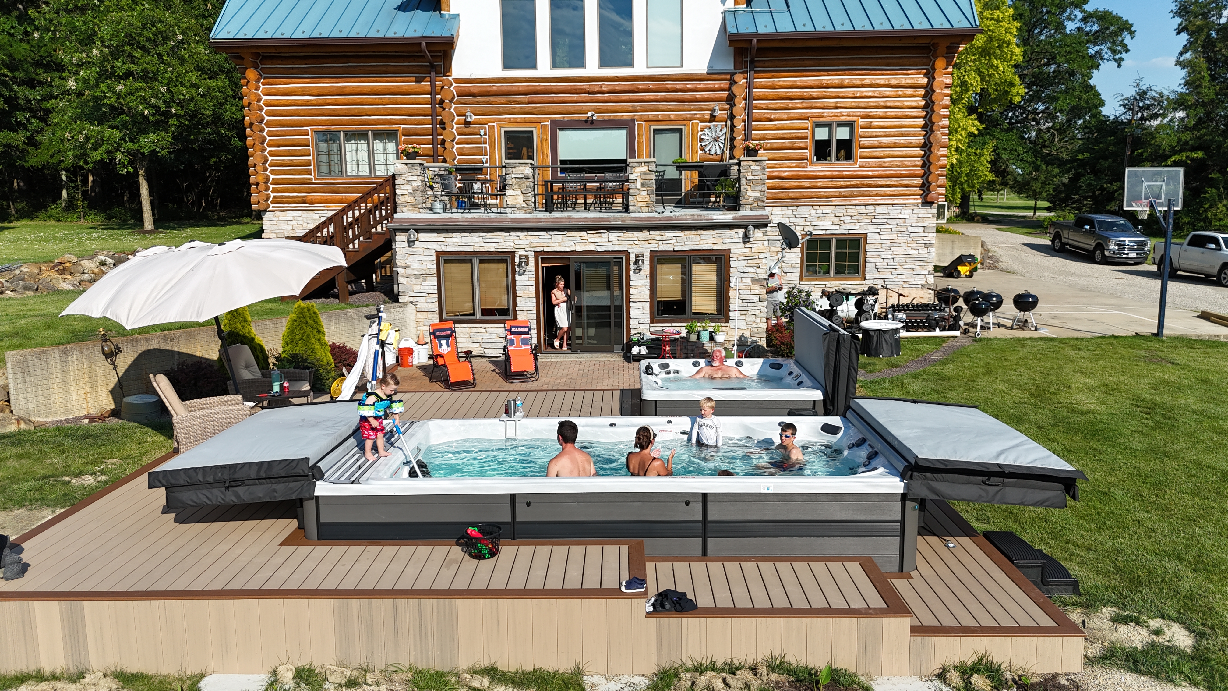 Family backyard swim spa oasis